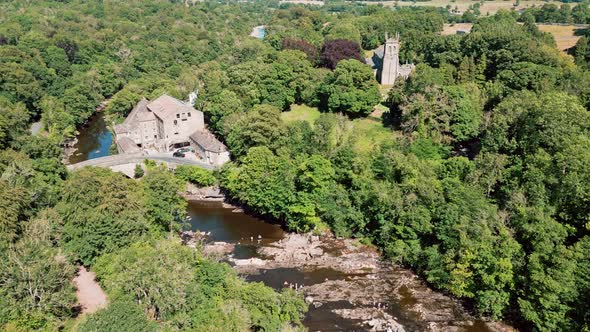 High ariel drone footage view of the famous Aysgarth FallsThe three stepped waterfalls at Aysgarth alt