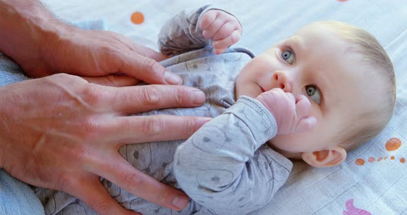 Baby boy relaxing at home  alt