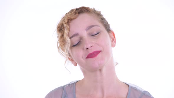 Face of Happy Beautiful Blonde Woman Relaxing with Eyes Closed alt