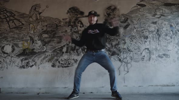 Modern dance in an old building - graffiti background alt