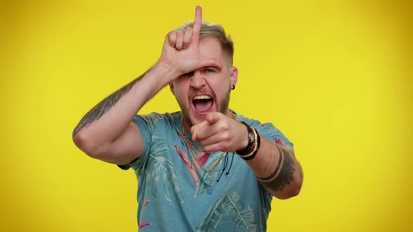 Man Tourist Showing Loser Gesture and Pointing on you Blaming Accusing for Unsuccess Bullying Abuse alt
