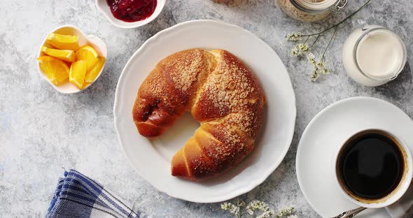 Baked Croissant with Drinks on Table alt