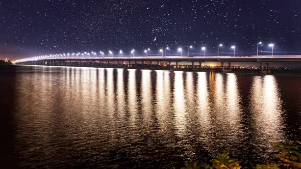 Time Laps View of the Bridge Over the Dnieper River in Dnipro City in Late Spring in Early Spring alt