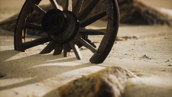 Large Wooden Wheel in the Sand alt