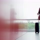 A Panoramic Shot of a Blonde Middle Aged Business Woman Gladly Proceeding with Her Hand Luggage To - VideoHive Item for Sale