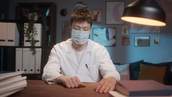 COVID19 Coronavirus Pandemic Happy Asian Doctor Positive with Hope Wearing Surgical Mask Video Chat alt