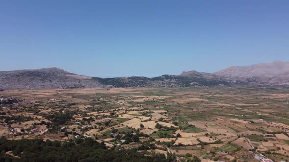 Aerial Nature Greek Landscape with Sea Mountain Olive Trees and Houses in Crete