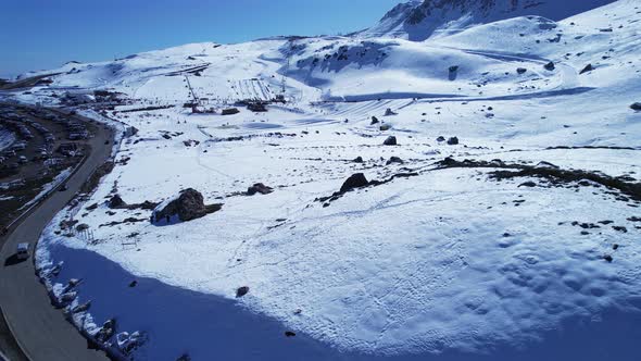 Panoramic view of Ski station centre resort at snowy Andes Mountains. alt