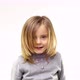 Beautiful Happy Fun Young Child Blond Smarty Girl Smiling and Making Faces - VideoHive Item for Sale