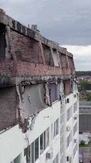 Vertical Video of a Wartorn Apartment Building in Ukraine alt