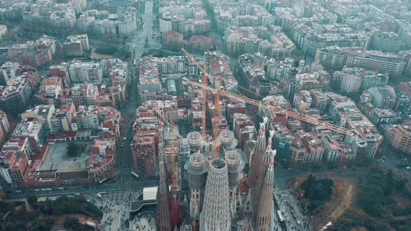 Aerial panoramic view of Barcelona cityscape; famous Europe architecture of houses and parks