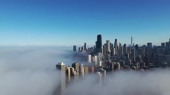 Chicago Cityscape Covered in Fog - Aerial Shot alt