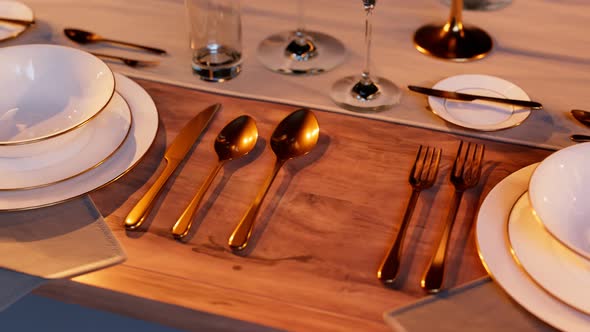 Elegant tableware at the restaurant. Dinner set at the reception. Candles light. alt