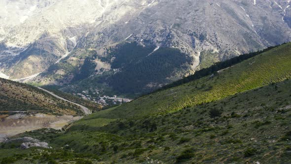 Anonymous adventurer back shot in mountain