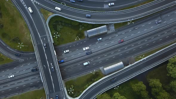 Aerial View Flying Over of Loaded Cars with Traffic Jam at Rush Hour on Highway with Bridge