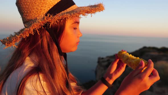Happy Girl Eating Corn alt
