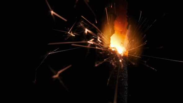 Lightening Sparkler on Black Background in Slow Motion Macro Shot alt