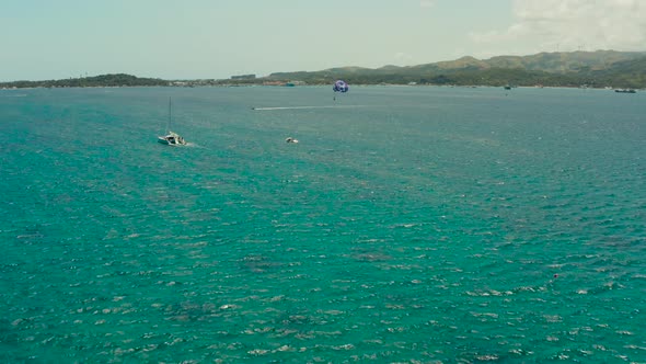 Parasailing on the Island of Boracay Philippines alt