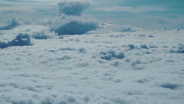 Flying Through Beautiful Clouds in an Airplane