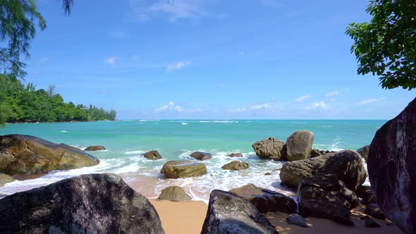 Amazing beautiful seashore rocks in Phuket island Sea waves crashing on rocks alt