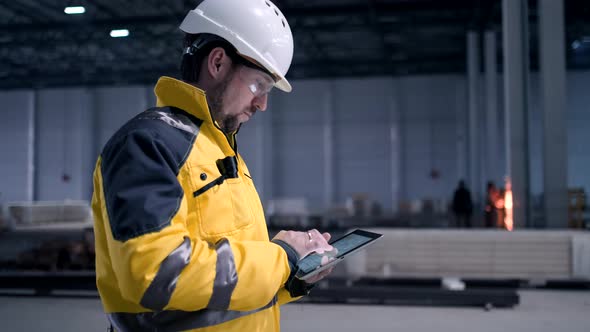 Portrait of Professional Heavy Industry Engineer / Worker Wearing Safety Uniform,  alt