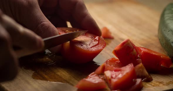 Tomato slicing slowmotion close up