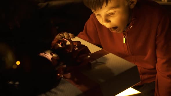 Kid receiving a magical gift for Christmas