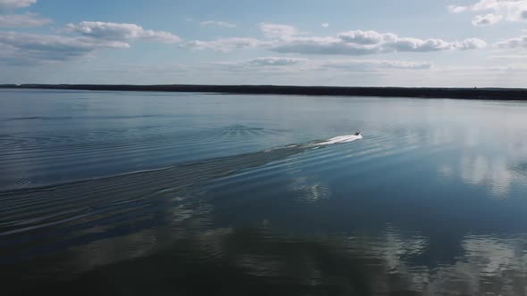 Speedboat Quickly Floats on the Water Surface