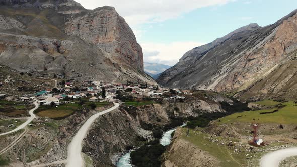 Aerial View of the Village Which is Located Between Caucasus Mountains alt