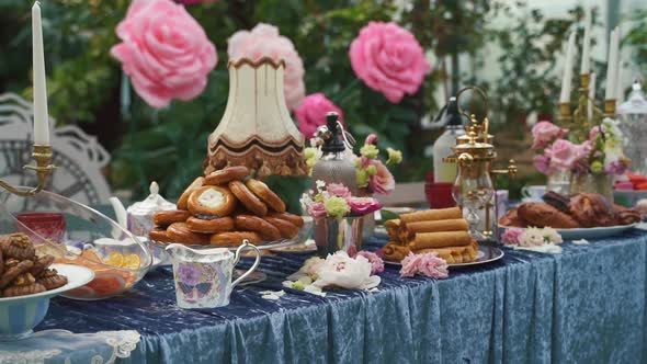 Delicious Decorated Sweets on Buffet Table Party Catering in Garden