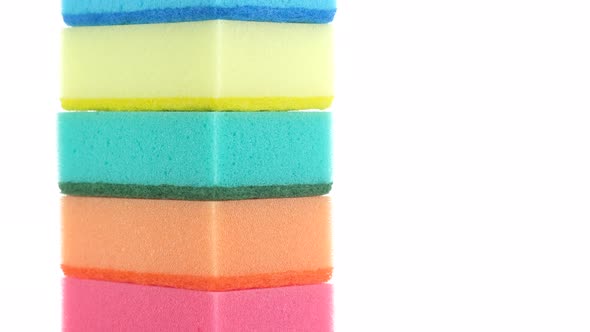 dishwashing sponges close up on white background. cleaning products alt