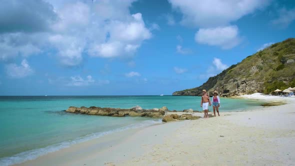 Couple Men and Woman Mid Age on the Beach of Curacao Grote Knip Beach Curacao Dutch Antilles alt