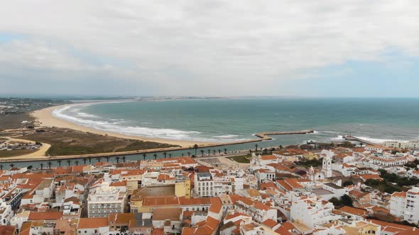 Lagos cityscape and Atlantic ocean sand beach, Algarve. Aerial view alt