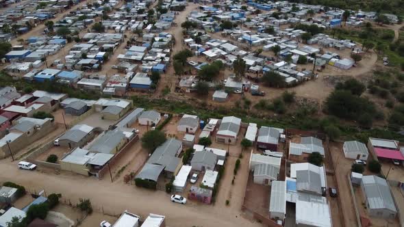 Dusty streets with small houses in a district of Windhoek, Namibia, morning alt