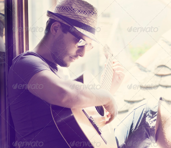 Man with the Guitar - Stock Photo - Images