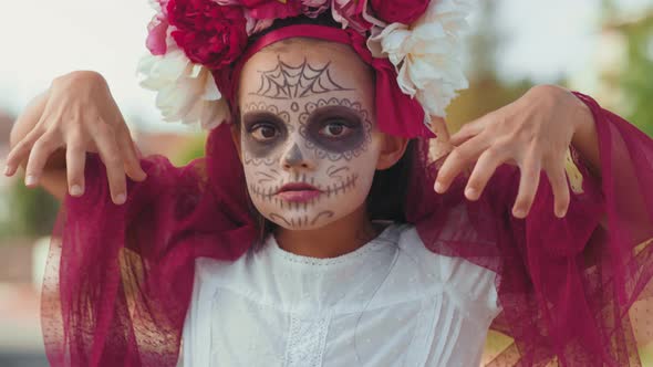 Little Girl in Halloween Costume Posing for Camera alt