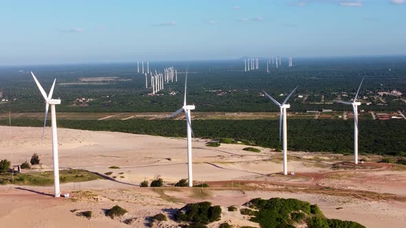Wind farm turbines at Canoa Quebrada Beach Ceara Brazil. Green energy. alt