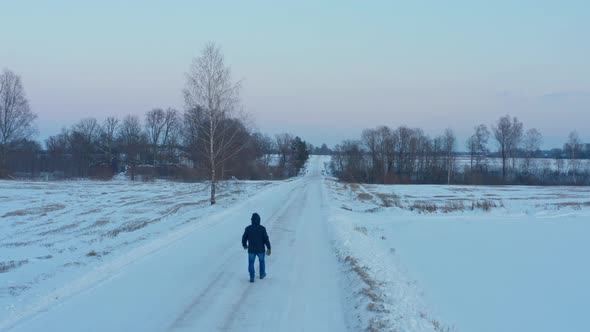 Man on Winter Road
