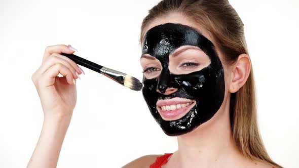 Girl Apply Black Carbo Peel Off Mask 
