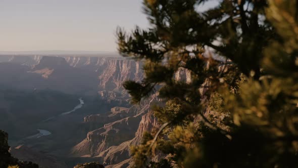 Beautiful Background Shot Revealing Amazing Colorado River and Sunset Mountains View of Epic Grand alt