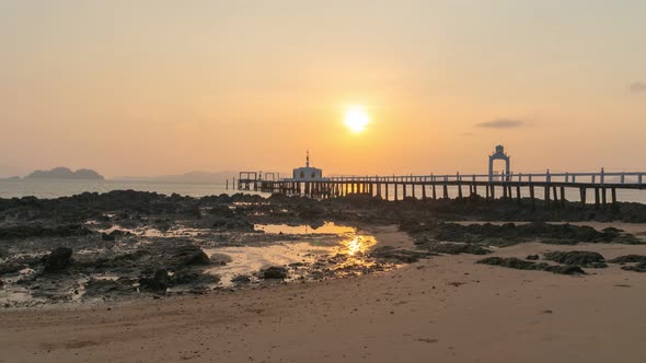 Timelapse Beautiful Sunrise  Above The Water Pagoda At Pier. alt