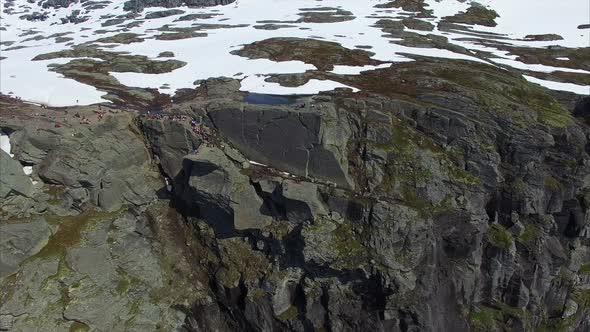 Aerial footage of Trolltunga rock in Norway alt