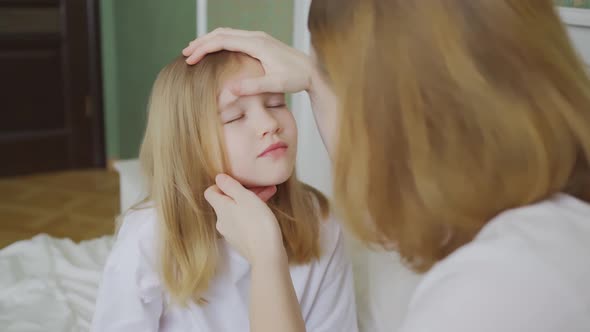 Daughter Complains About a Mote or Pain in Eye and Mother Examines Her alt