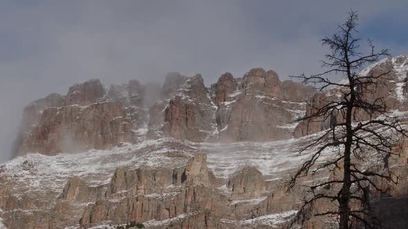 Cliffs from Hayden Peak in the Uinta Mountains steaming as the snow melts alt