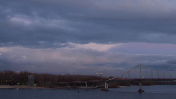 Big Bridge Across The River At Sunset In Kiev, Evening, Winter