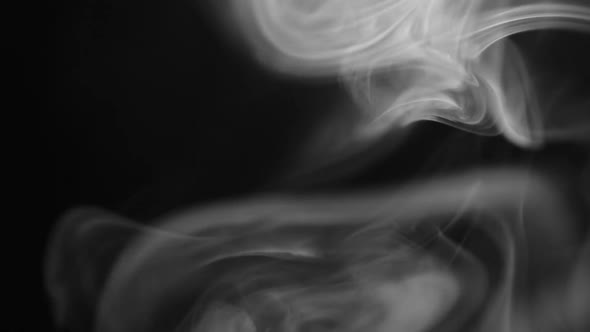White Smoke on Black Background Slow Motion