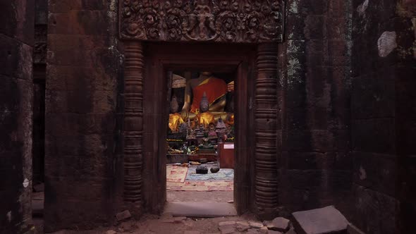 Vat Phou ruined Khmer Hindu Mountain Temple. Buddhism, Buddhist altar, buddha statues. Laos. Slow