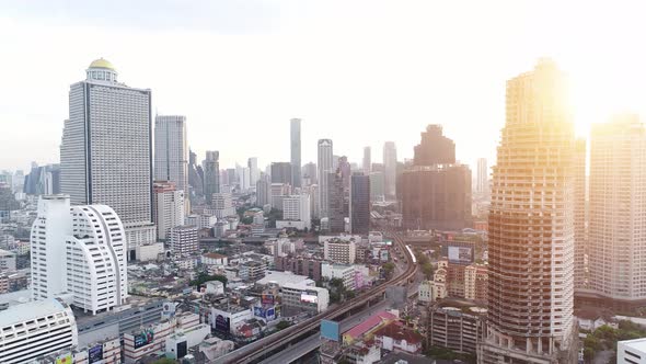 4k Aerial city view of Bangkok dowtnown, Flying over Bangkok, Thailand. alt