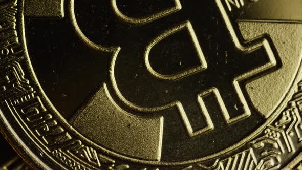Rotating shot of Bitcoins  alt