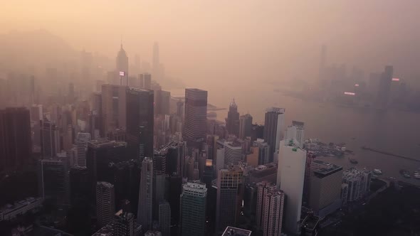 Modern Skyscrapers In Hong Kong City. buildings in Hong Kong city on sunrise. alt